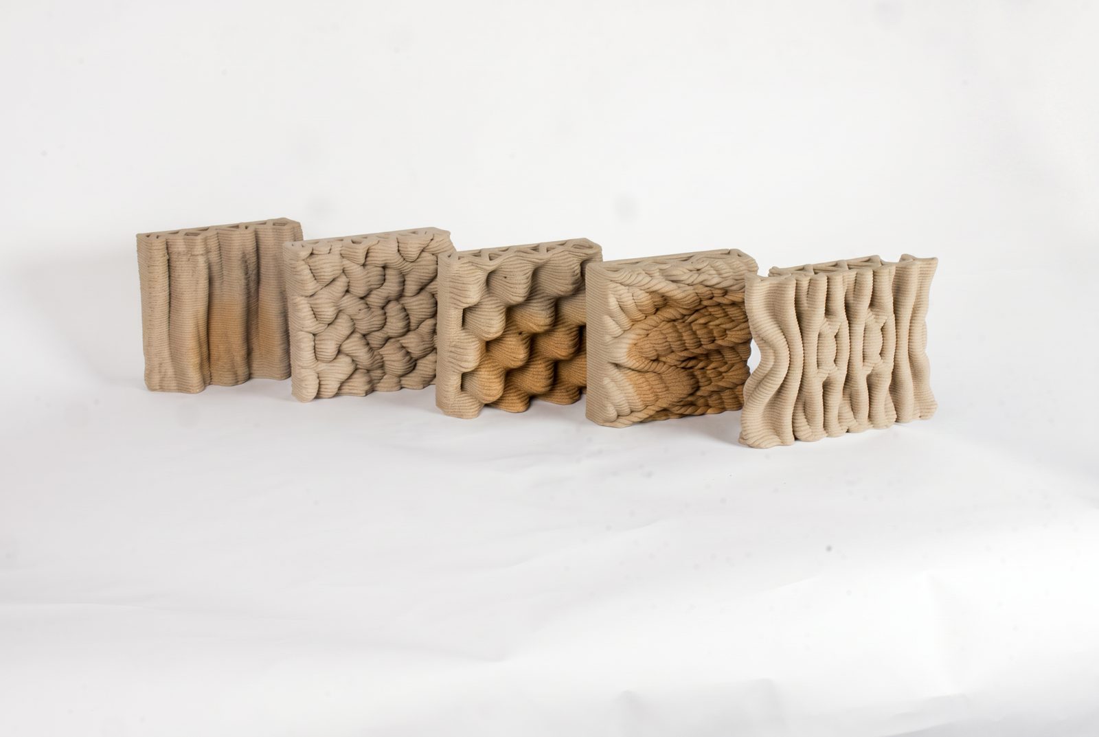 Five printed surfaces, compared for capillary uptake and water retention